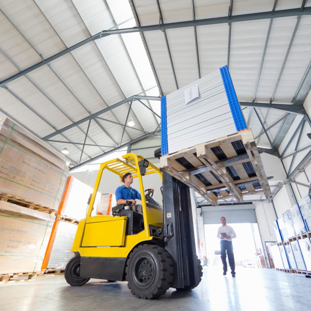 businessman-supervising-forklift-truck-driver-work-2026-03-26-08-25-08-utc